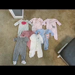 7 baby sleepers from Carter’s. All size 6 months.